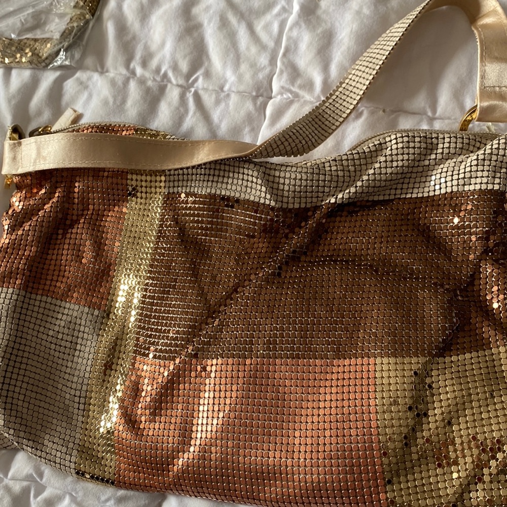 I have TWO OF THESE, gold, tan and dark brown combo